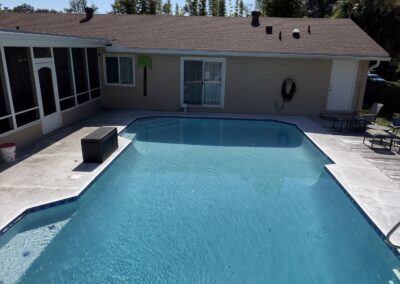 Freeform pool and spa combo after renovation by Planet Pool Renovations in Orlando, FL