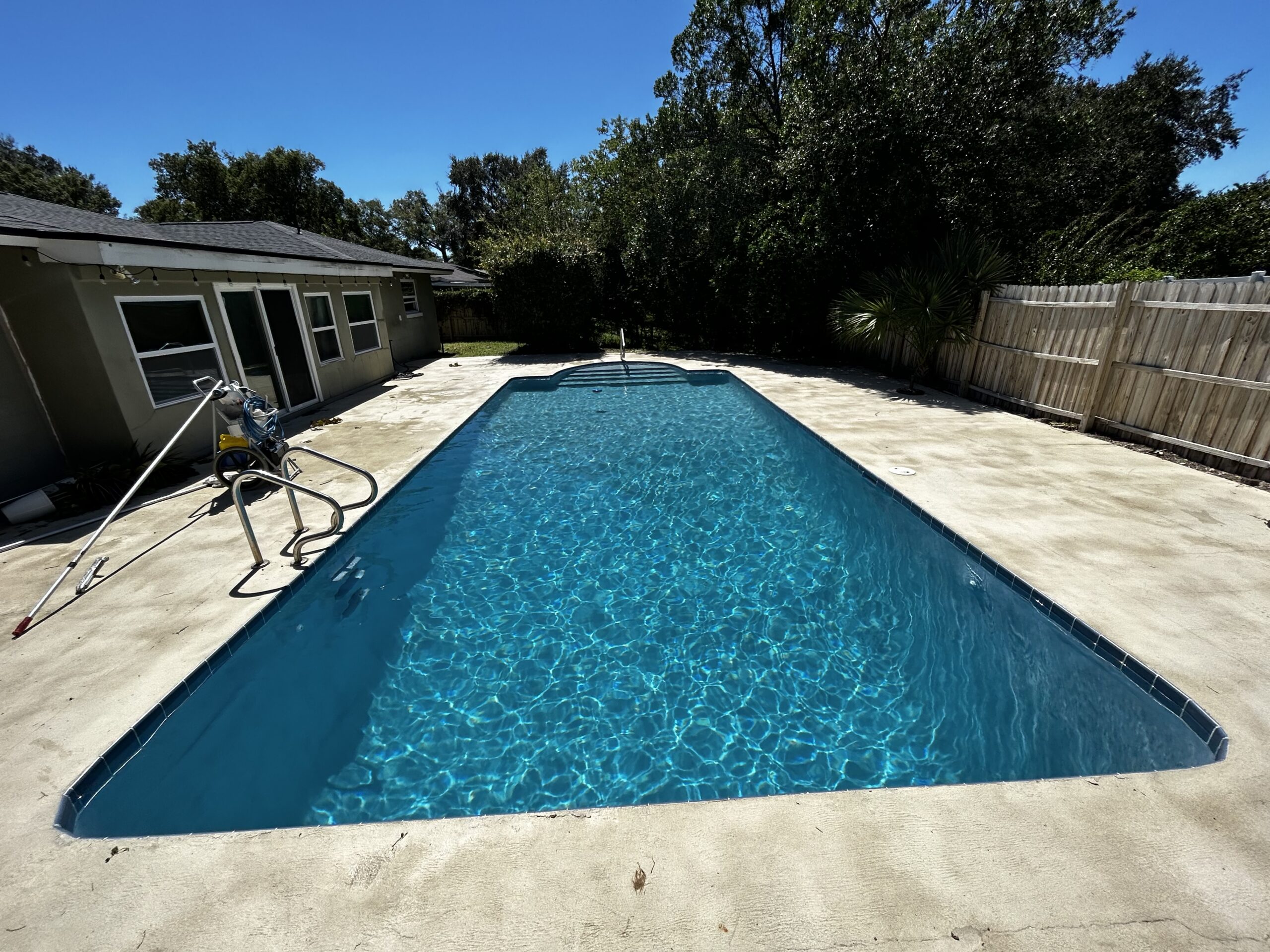 Freshly resurfaced pool refilled and swim-ready